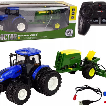 Mėlynas traktorius su presu