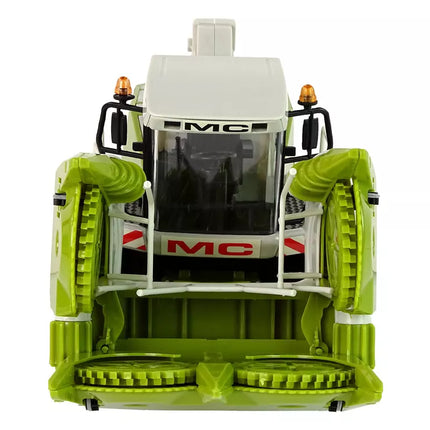 Žalias kombainas su judančiomis dalimis