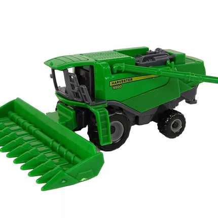 Žalias kombainas su sėjamąja