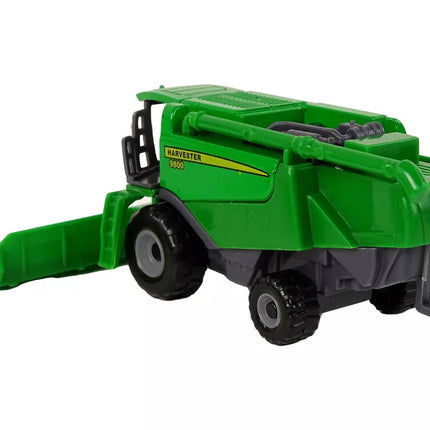 Žalias kombainas su sėjamąja