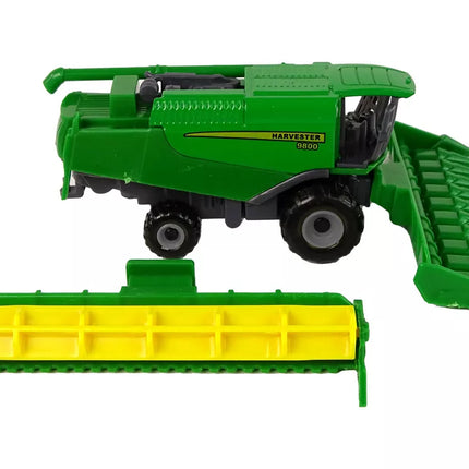 Žalias kombainas su sėjamąja