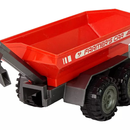 Žalias traktorius su raudona priekaba