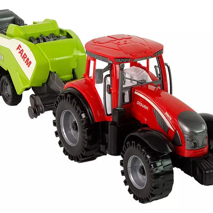 Raudonasis žemės ūkio traktorius su sėjamąja