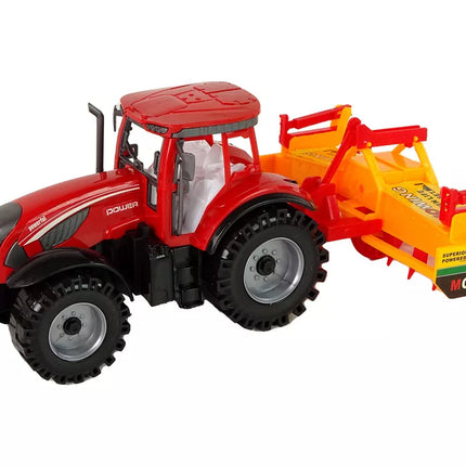 Raudonas traktorius su kultivatoriumi