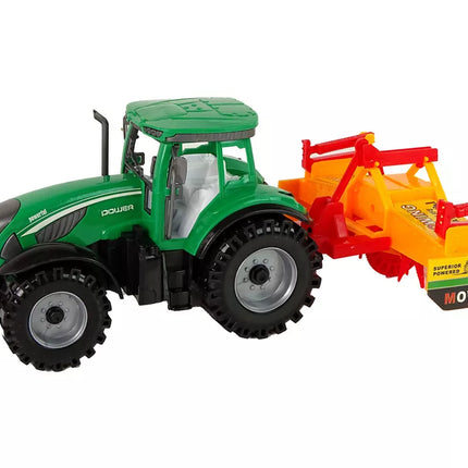 Žalias traktorius su oranžiniu kultivatoriumi vaikams