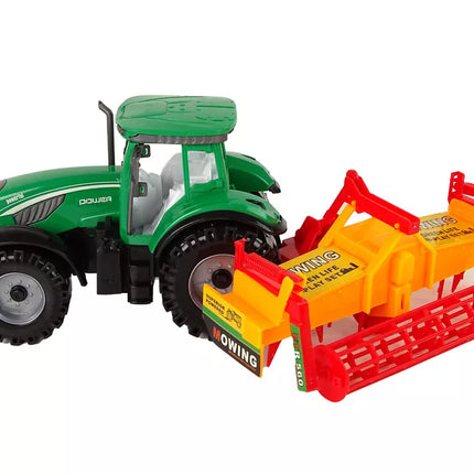 Žalias traktorius su oranžiniu kultivatoriumi vaikams