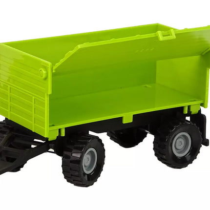 Šviesiai žalias traktorius su priekaba