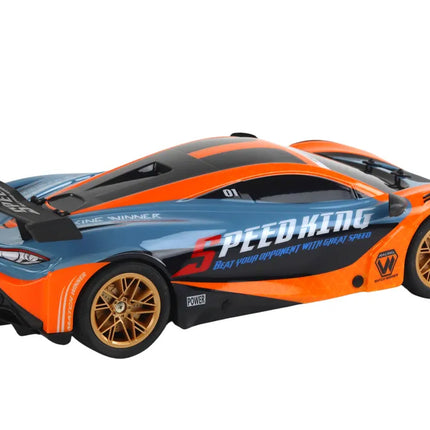 Nuotolinis sportinis automobilis oranžinis