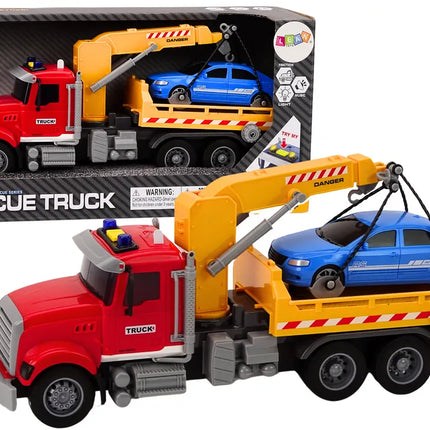 Raudonas tralas su kranu ir automobiliu