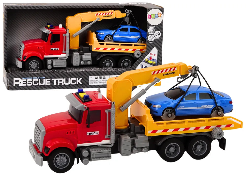 Raudonas tralas su kranu ir automobiliu