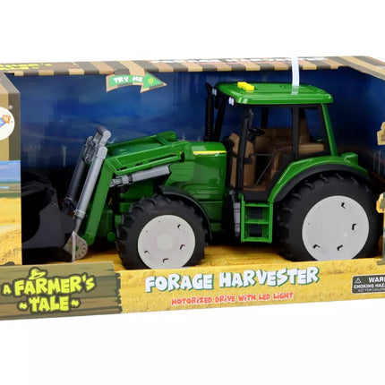 Žalias ūkio traktorius su kaušu