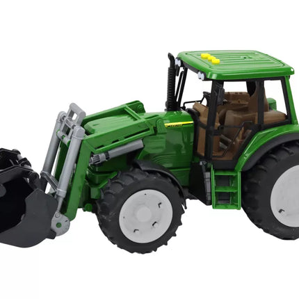 Žalias ūkio traktorius su kaušu