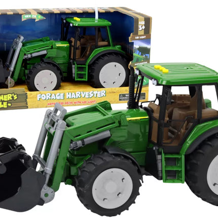 Žalias ūkio traktorius su kaušu