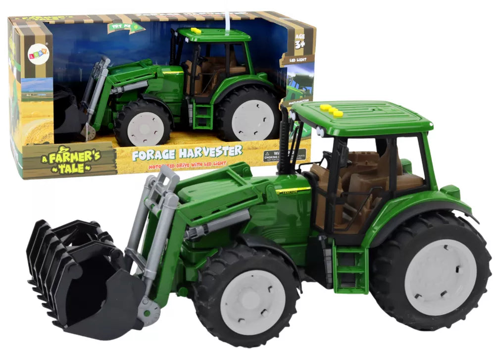 Žalias ūkio traktorius su kaušu