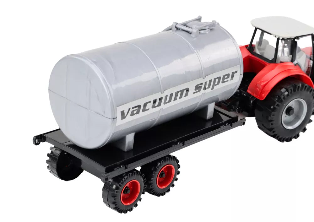 Raudonas žemės ūkio traktorius su cisterna