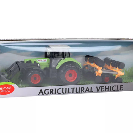 Žalias žemės ūkio traktorius su diskinėmis akėčiomis