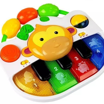 Muzikinis pianinas su beždžionėle