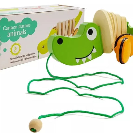 Medinis žalias krokodilas ant ratukų