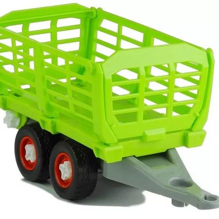 Žalias traktorius su priekaba ir atsuktuvu