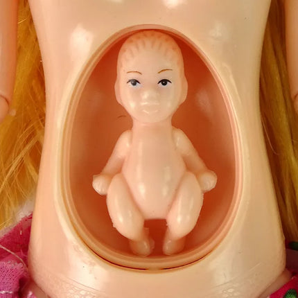 Nėščia lėlė rožine suknele su kūdikiu