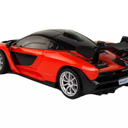 Raudonas sportinis automobilis McLaren