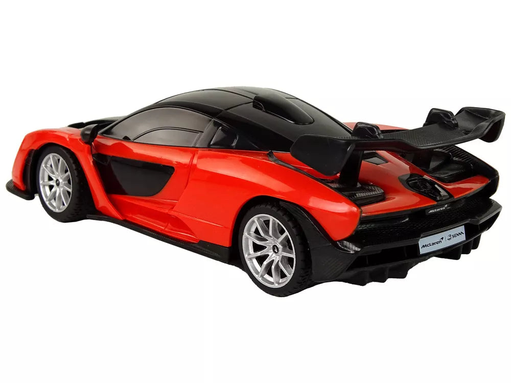 Raudonas sportinis automobilis McLaren