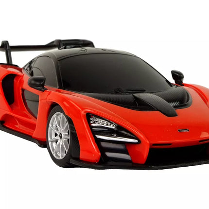 Raudonas sportinis automobilis McLaren