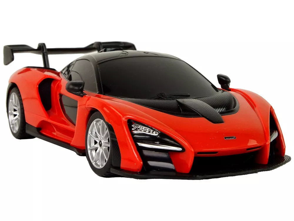 Raudonas sportinis automobilis McLaren