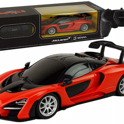 Raudonas sportinis automobilis McLaren