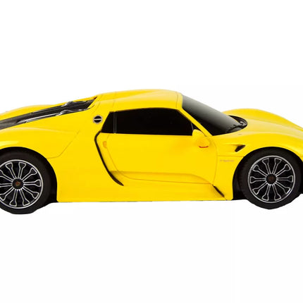 Radijo bangomis valdomas geltonas automobilis Porsche