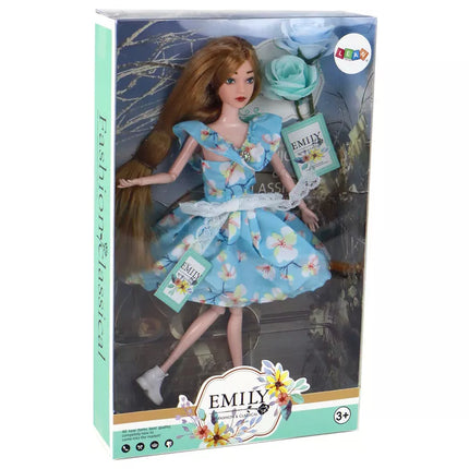 Ilgaplaukė lėlė Emilija su mėlyna gelėta suknele