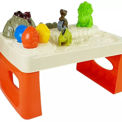 Dinozarų pasaulio stalas su ugnikalniu ir kiaušinių formelėmis