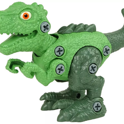 Oranžinis dinozauro kiaušinis su išardomu žaliu dinozauru