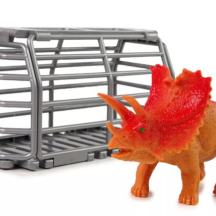 Žalias visureigis su dinozaurų transportavimo preikaba ir dinozauru