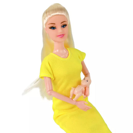 Nėščia lėlė su geltona sukenle