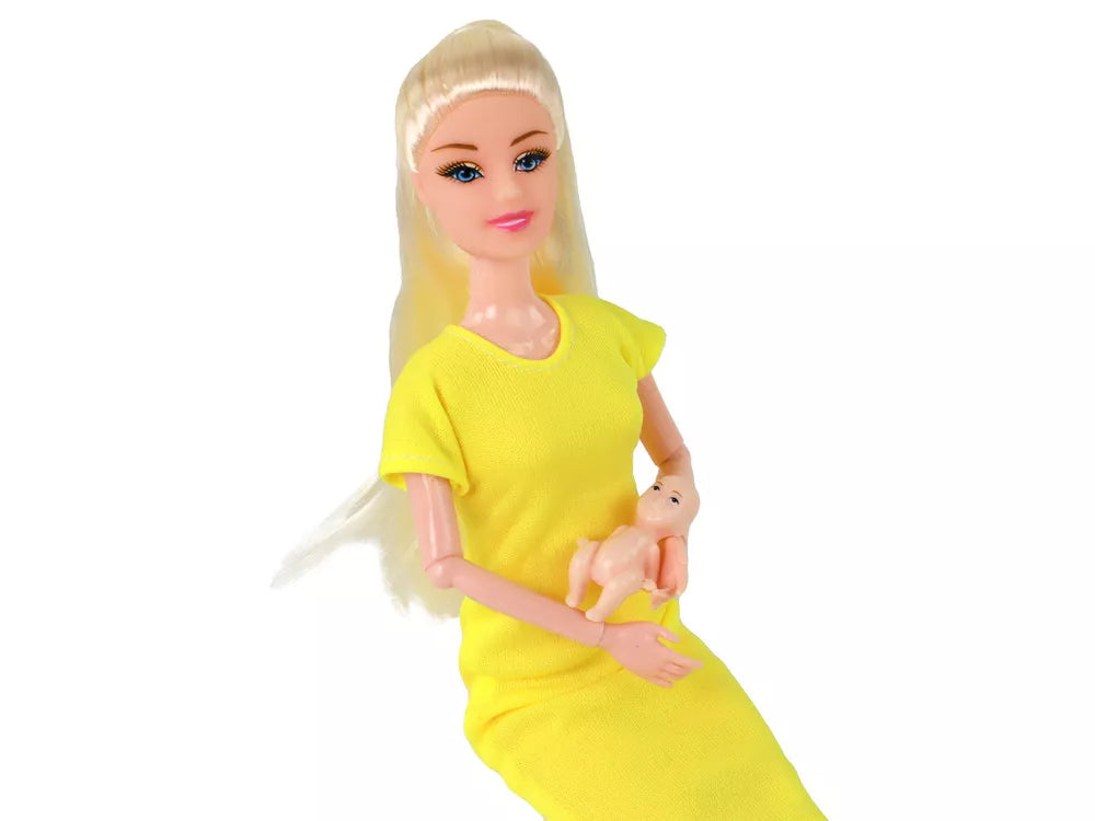 Nėščia lėlė su geltona sukenle