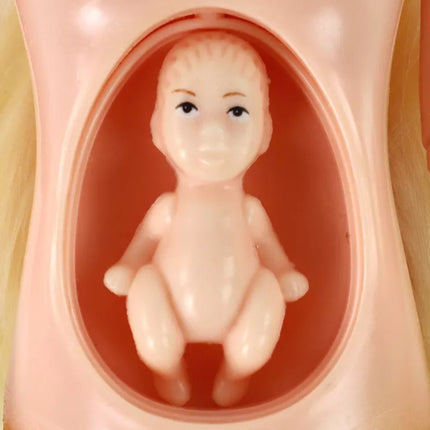 Nėščia lėlė su geltona sukenle