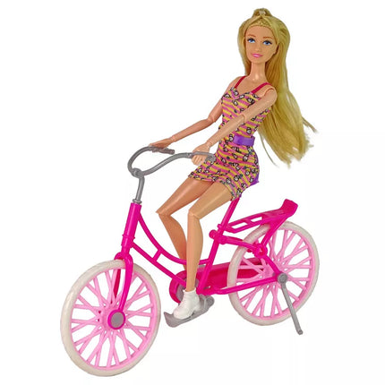 Lėlė ir rožinis dviratis