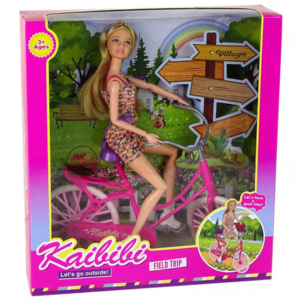 Lėlė ir rožinis dviratis