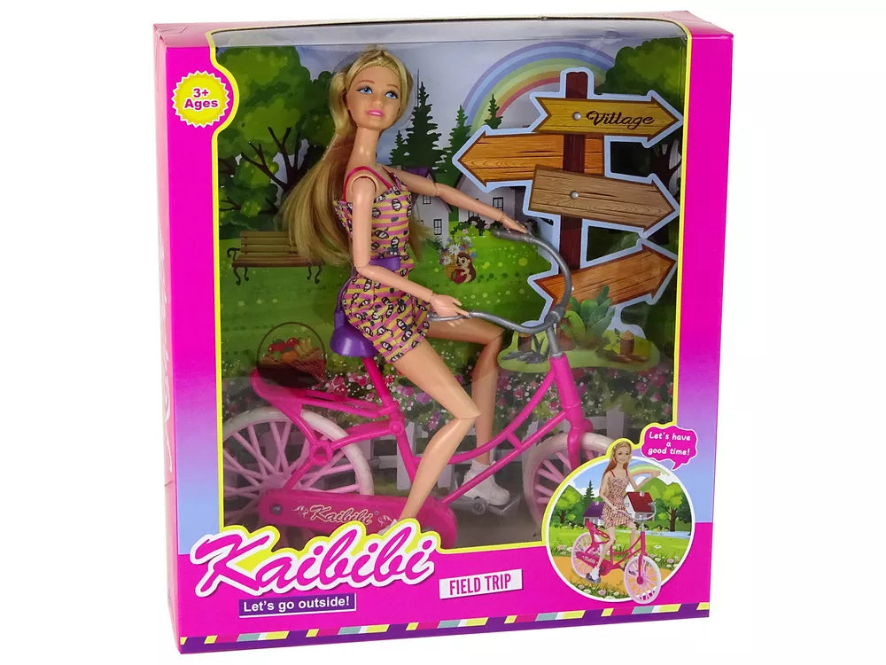 Lėlė ir rožinis dviratis