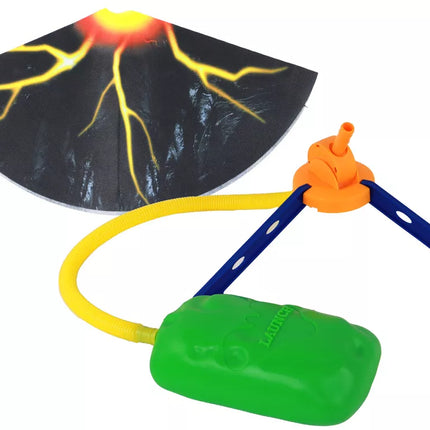 Juodas ugnikalnis su dinozaurų formos raketomis