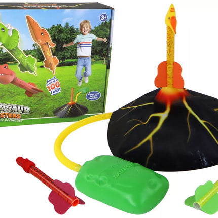 Juodas ugnikalnis su dinozaurų formos raketomis