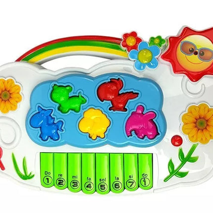 Baltas elektroninis fortepijonas su mėlynu mikrofonu