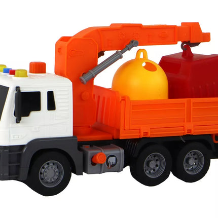 Oranžinė šiukšliavežė su kranu