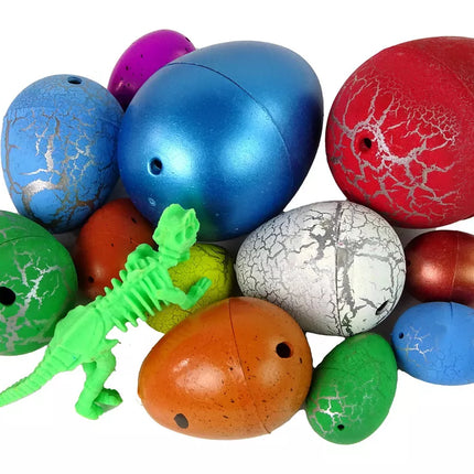 Įvairių dydžių dinozauro kušiniai su dinozauru