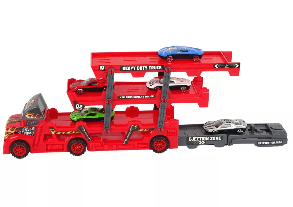 Didelis raudonas trijų aukštų vilkikas