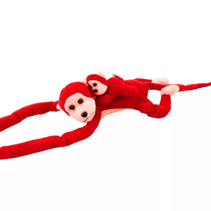 Pliušinė raudona beždžionė su kūdikiu