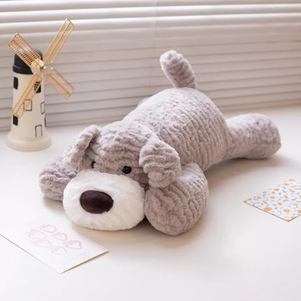 Šviesiai pilkas pliušinis šuo