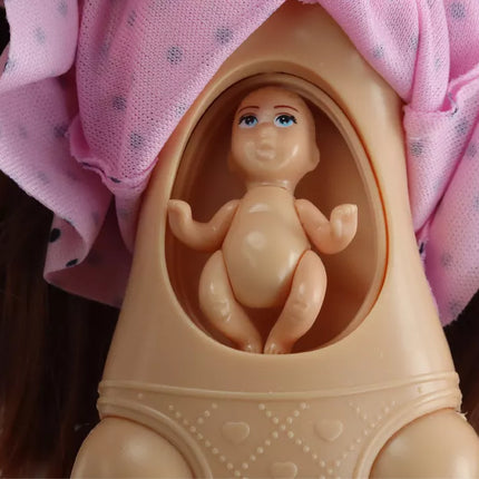 Nėščia mama lėlė su rožine suknele ir priedais.