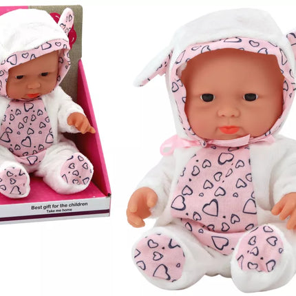 Mažas kūdikio lėlė su baltais drabužiais